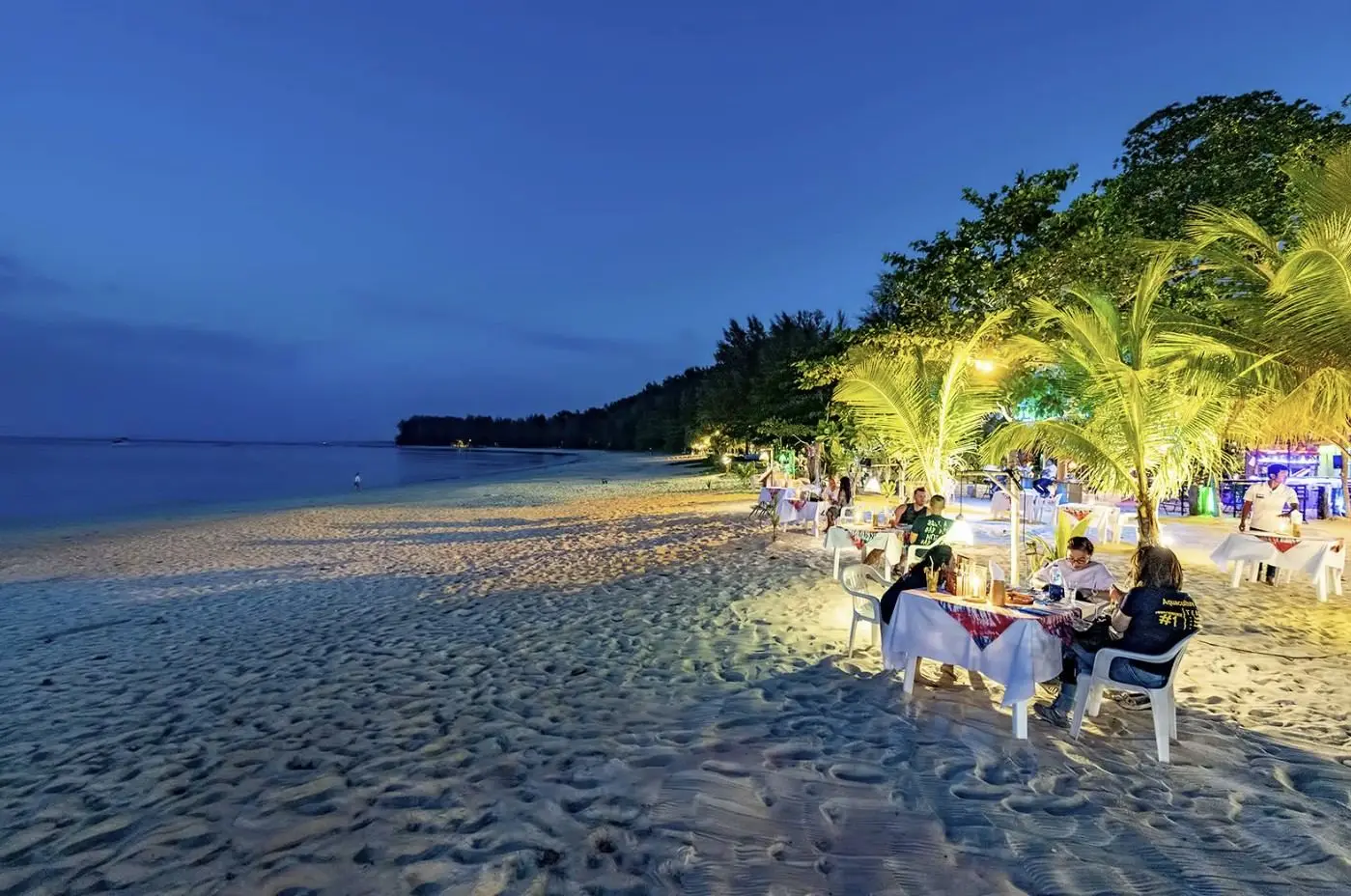Dinner on the sand at dusk, Nai Yang Beach